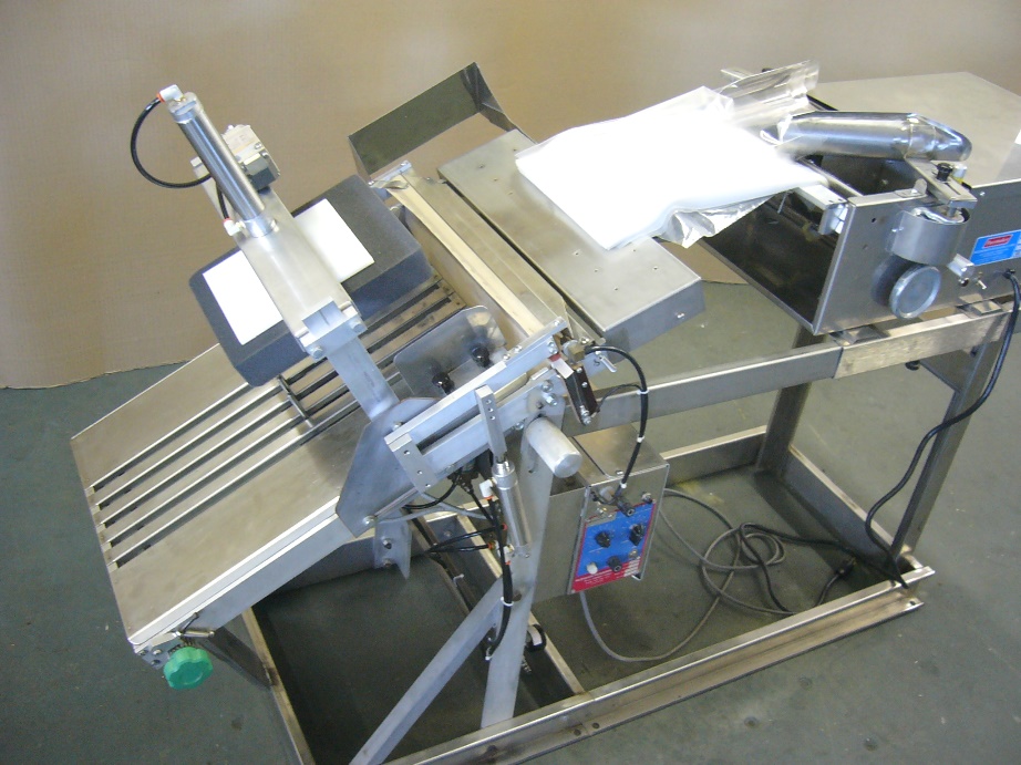 K840 Folder, Bagger/Drop Sealer & Incline Conveyor Used